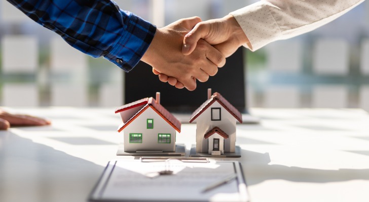 Closeup of a handshake representing a real estate deal.