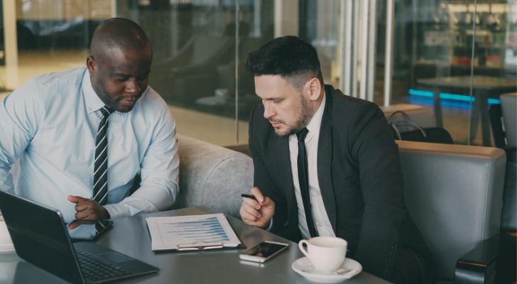 A financial advisor discusses his client's investment options.