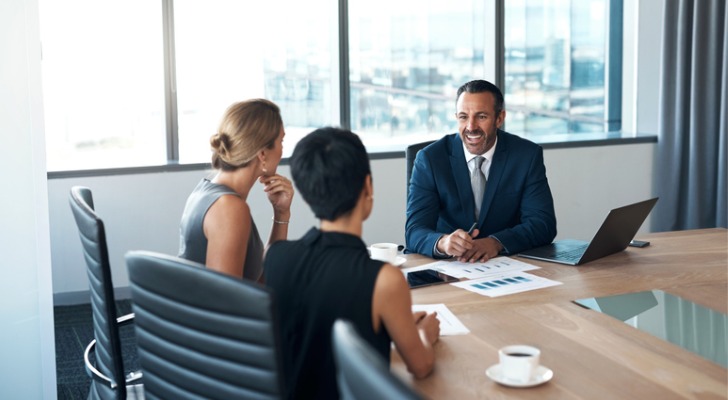 Clients meeting with a RIA advisor