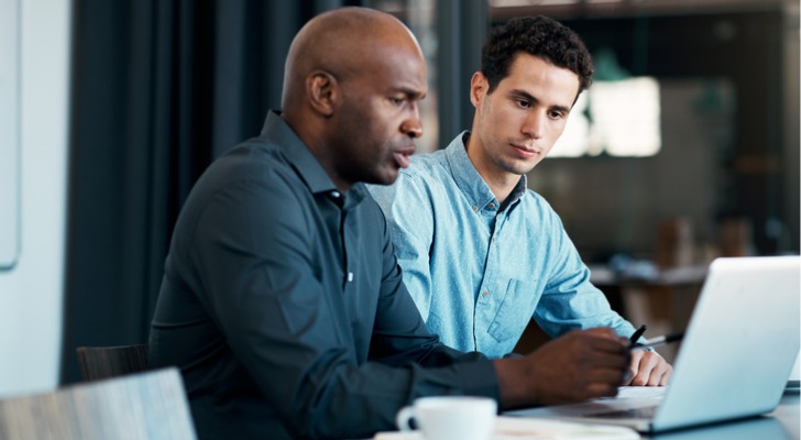 An advisor explaining pretax contributions to a client