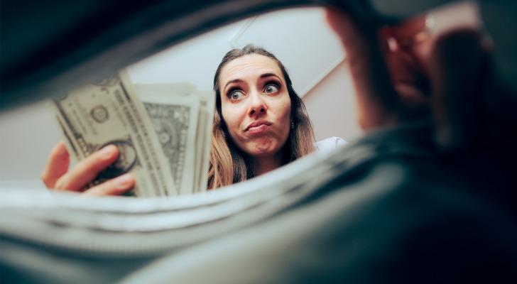 A woman taking money from her own account via a 401(k) loan