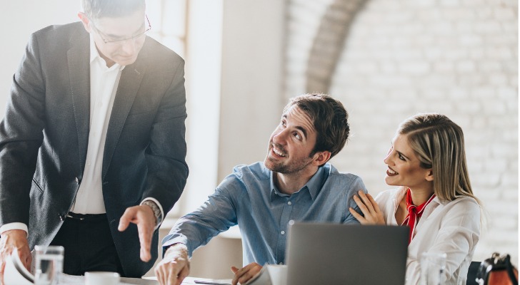 An investment advisor working with clients.