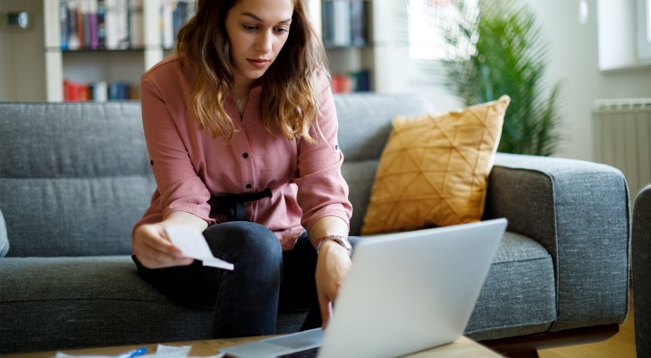 Investor checks her mutual fund fees