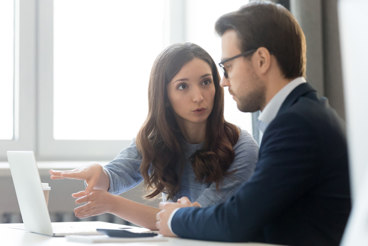 A CFA and her boss prepare to attend a conference