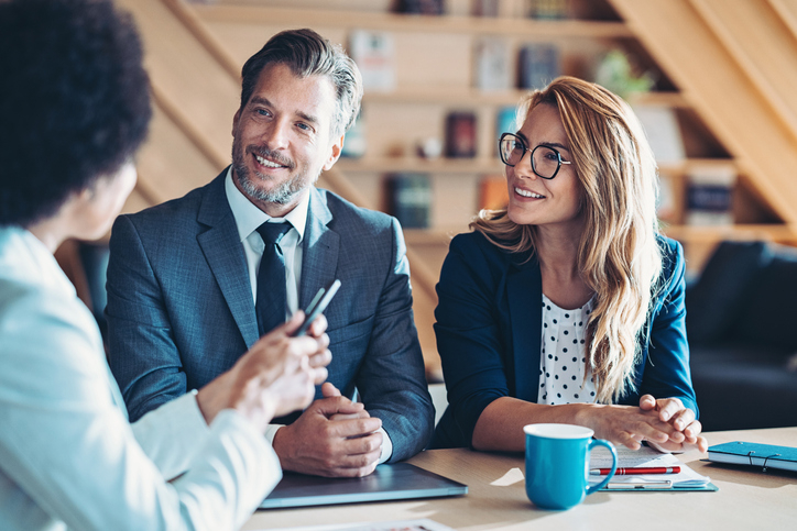 Couple consulting with their financial planner