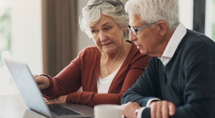 A senior couple reviews their annuity buyout options.