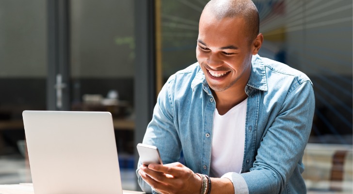 A man seeing how much tax liability he's saving with pretax contributions