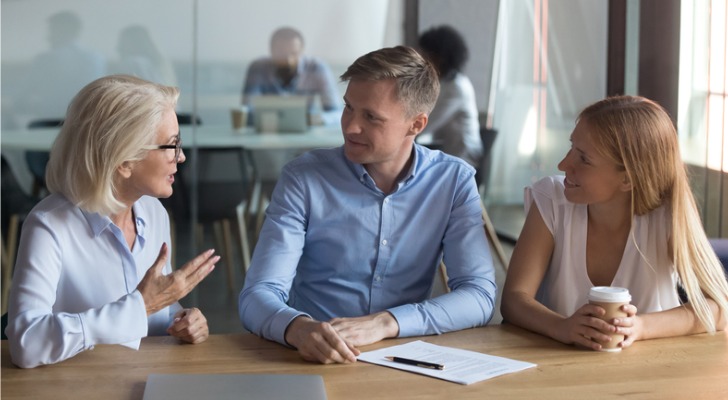 A financial advisor working with a couple in their 20s