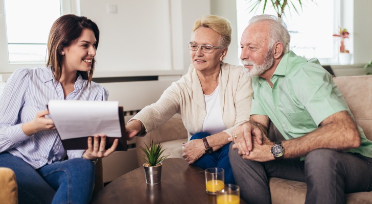 A financial advisor covering the pension buyout options for a couple.
