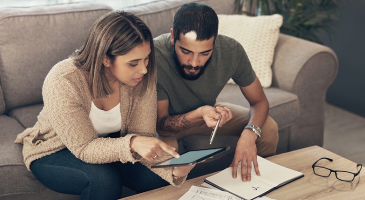 A couple trying to decide if they should invest into a short squeeze.