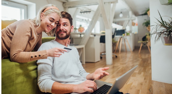 A couple talking about buying something on credit instead of living within their means