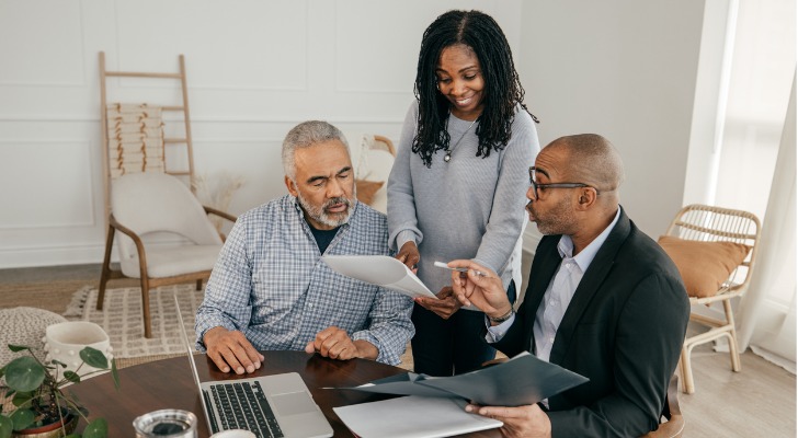 An advisor walking through the estate plan that includes an inherited IRA with his clients