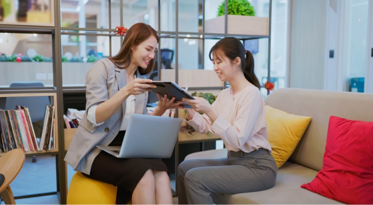 Two women assigning a value to the firm's intangible assets