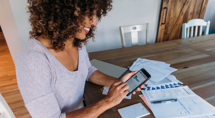 Happy user with a beginning investment app