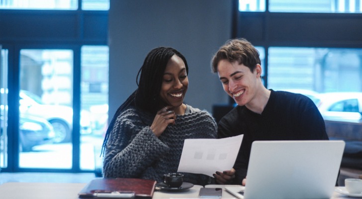 Couple talking about diversifying their portfolio.