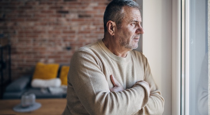 A man thinking about ways to protect his retirement nest egg in the retirement risk zone.