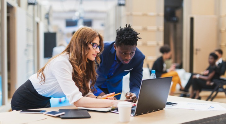 CFP instructor explaining to a student some key ethics principles.