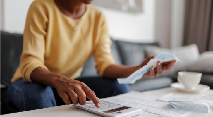 A woman tallies up her non-passive losses from her business.