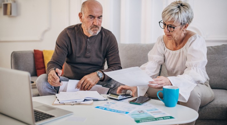 A couple assessing whether they should take out a CD loan.