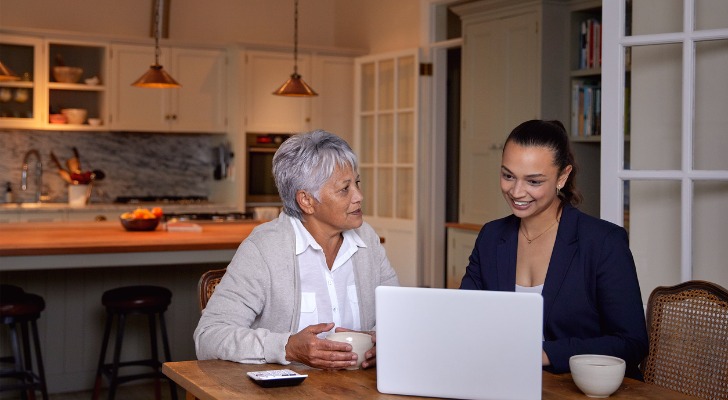 A financial advisor explaining financial planning regulations to a client