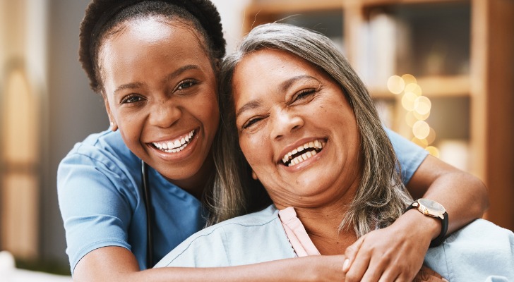 Grateful daughter hugs mom after getting a generous gift to help buy a home