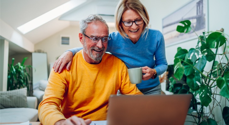 A couple monitoring their personal pension plan funds.