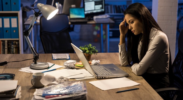 A woman looking at her trade lines and how she can improve her credit.