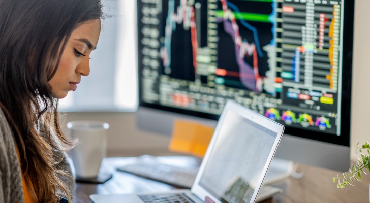 A woman looking at her fully diluted shares and their performance