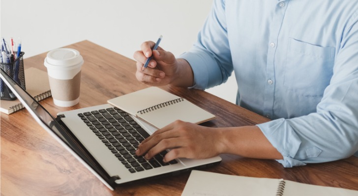 A man researching his participating rate.