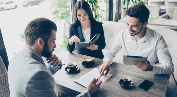 A man signing his ESOP paperwork