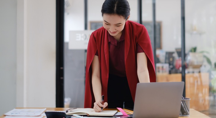 A homebuyer reviewing how much money she can save on tax benefits.