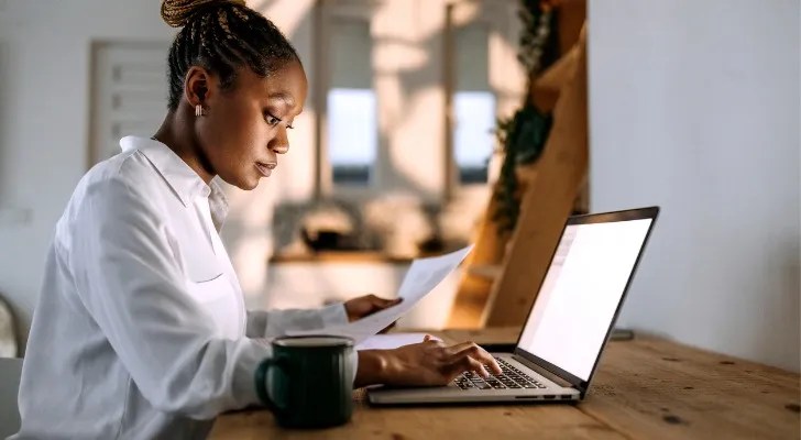 A financial advisor looking at a one-page financial plan template
