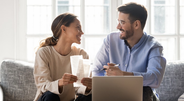 A couple confirming that their capital gains tax strategy has minimized their overall tax liability.