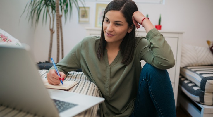 A woman trying to set long-term financial goals for her future.