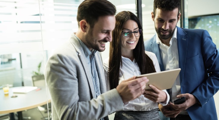 A financial advisor reviews different portfolio rebalancing strategies with a client.