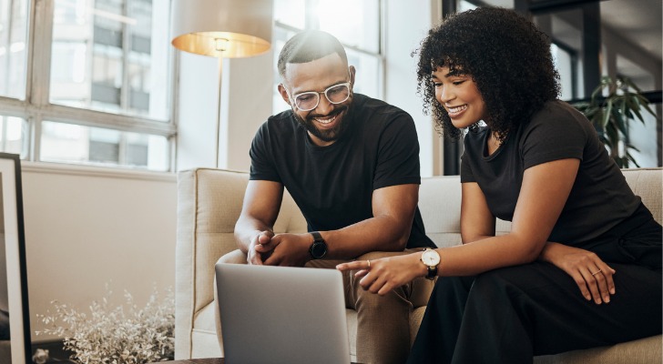 A couple trying to decide whether to use a Roth IRA and how much it will cost.