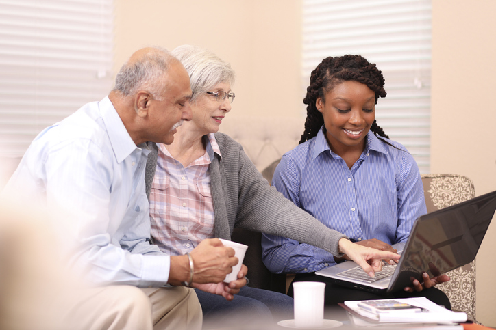 A financial advisor working with a senior couple to change their money scripts.