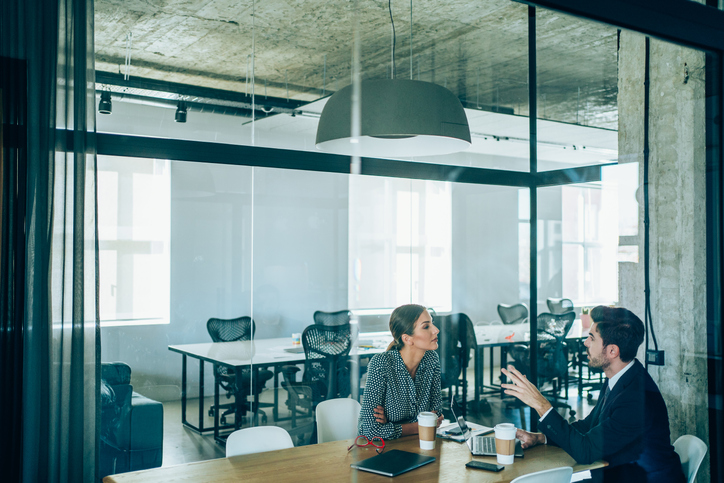 Financial planners reviewing financial planning marketing strategies for their services.