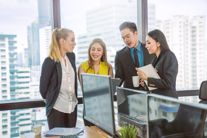 Financial advisors meeting to create a client service model for their target market.