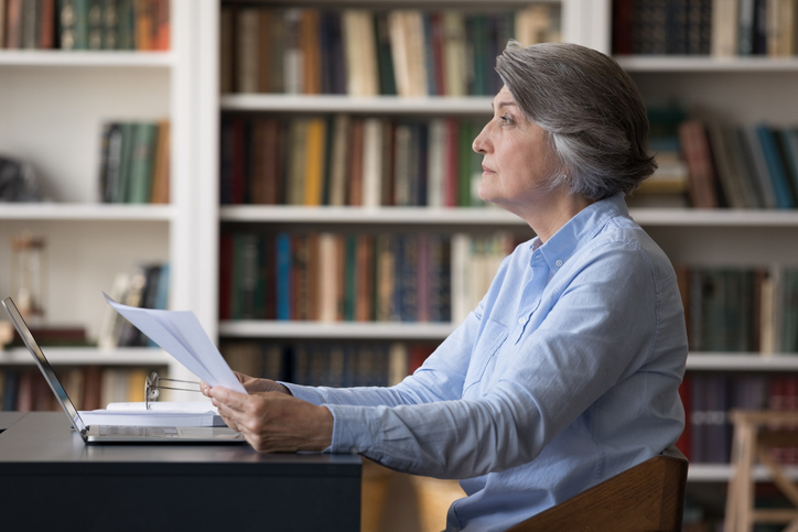 A senior thinking about her beneficiaries.