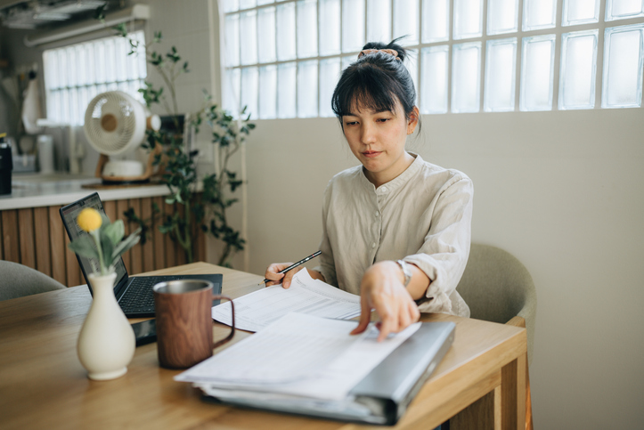 A woman reviewing the terms of her annuity.