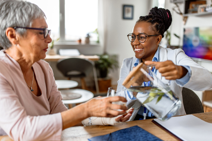 Senior getting medical services at home.