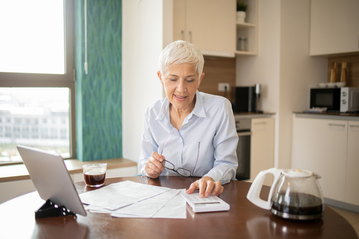 A senior reviewing Medicare coverage if she returns to work.
