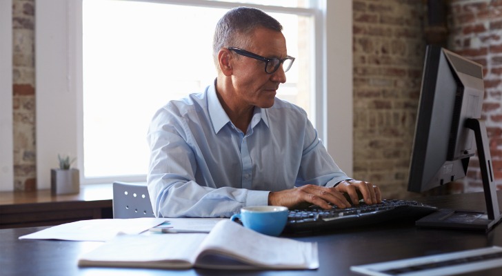 A man looking at the risk of a variable annuity and how much he will have in retirement.