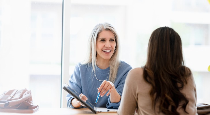 A financial advisor buying a book of business and transitioning clients to her firm.