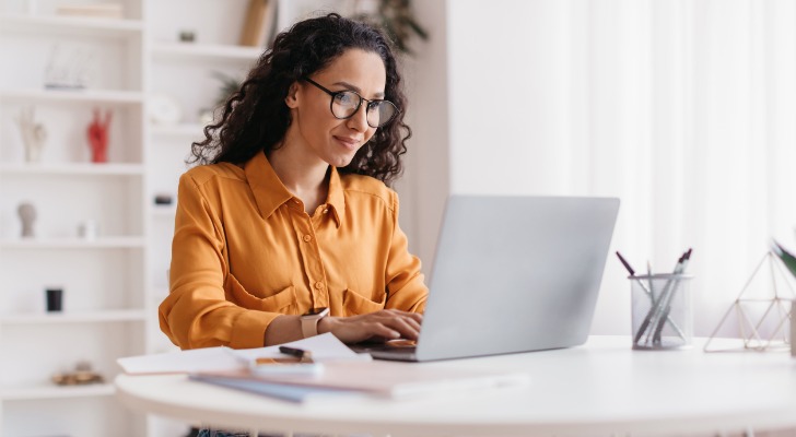 An IRA account holder researching mutual funds and ETFs for investment options.