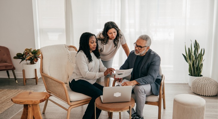 A financial advisor explaining catch-up contributions to their clients.