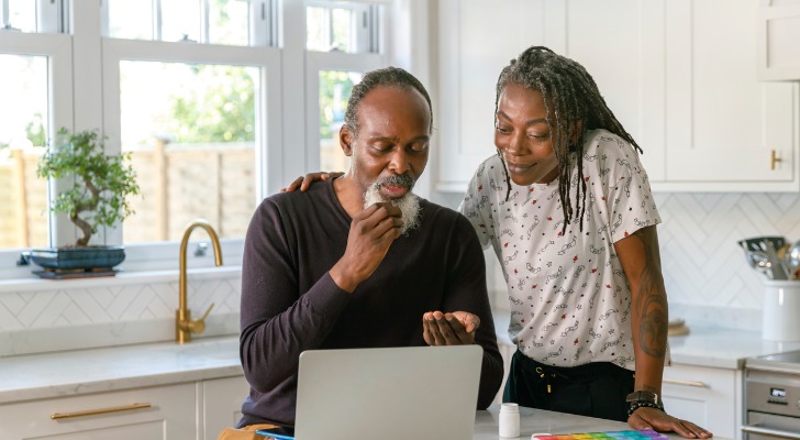 A couple analyzing different Medicare Savings Programs.