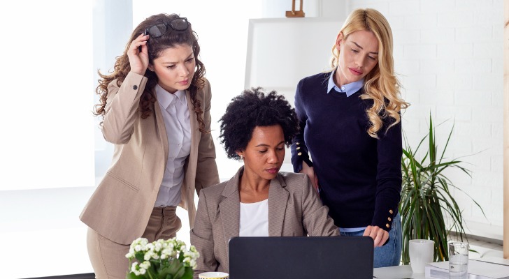 Financial advisors reviewing guidelines for SEC compliance