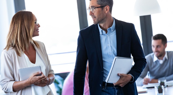 Financial advisors reviewing different tax-advantaged options for clients.